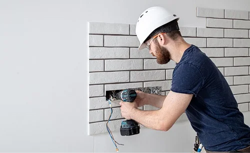 electricians-in-sun-city-az-installing-electrical-sockets